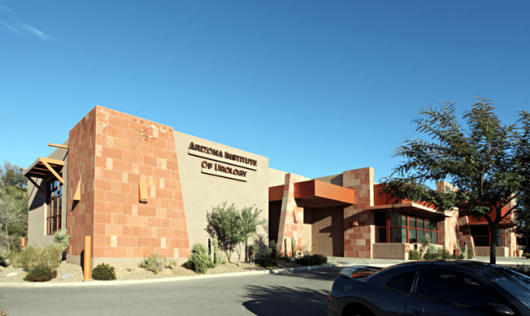 Medical building focusing on urology against a blue sky